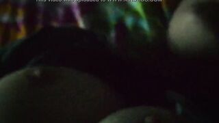 Jasmine is lying on the bed to the music and showing her charms (without sound)