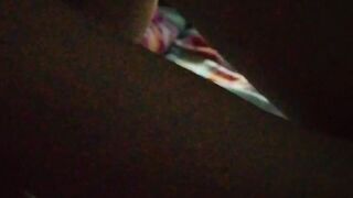 Jasmine is lying on the bed to the music and showing her charms (without sound)