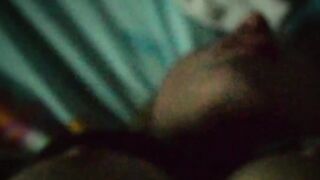 Jasmine is lying on the bed to the music and showing her charms (without sound)