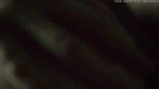 Jasmine is lying on the bed to the music and showing her charms (without sound)