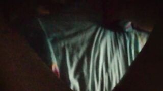 Jasmine is lying on the bed to the music and showing her charms (without sound)
