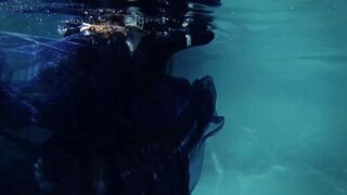 goth underwater shooting inside swimmimg pool. Arya Grander