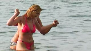Turned On German lesbians dildoing each other on the beach