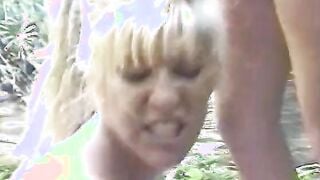Eager milf gets 2 dongs inside her holes public