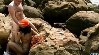 At the beach the dark hair mom has anal sex that ends with a facial