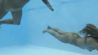 Pornstars Irina and Angelica swimming together