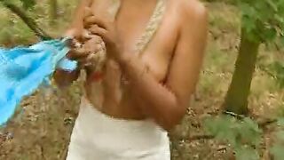 Sexsual blonde makes scene into the bush, masturbating!