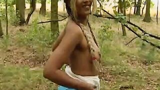 Sexsual blonde makes scene into the bush, masturbating!