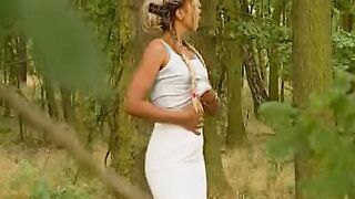 Sexsual blonde makes scene into the bush, masturbating!