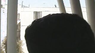 vulgar pussy undresses inside front of the window and fingered her cunt