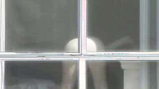 vulgar pussy undresses inside front of the window and fingered her cunt
