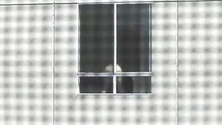 vulgar pussy undresses inside front of the window and fingered her cunt