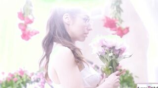 Curvy photographer rimmed by a florist