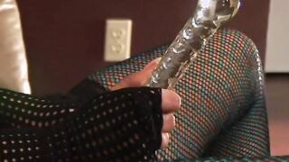 amazingly hot glass toy is pushed to the stop into her bare vagina