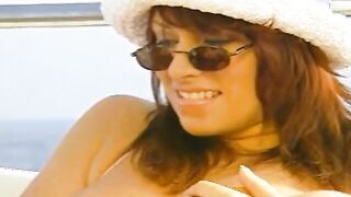 Lusty lesbians put vibrators on moving boats