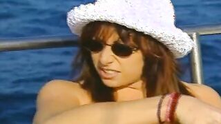 Lusty lesbians put vibrators on moving boats