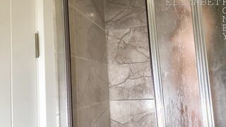 Long booty cougar Elizabeth Honey masturbates into the shower with a jet of water