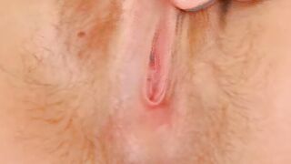 Round butt German cunt with mouth putting a pink sex toy inside her bushy vagina