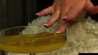 Blonde hot pours honey on her stunning body as she masturbates