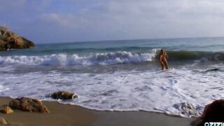 Her twat is soak when she notices a hung bro coming out of the ocean