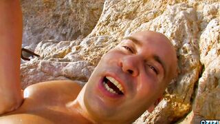Her twat is soak when she notices a hung bro coming out of the ocean