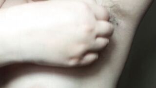 Ellie shows her unshaved armpits and plays with them