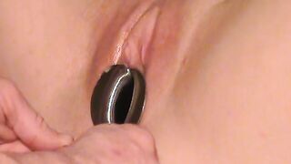 Spreading her cunt open with speculum and fucking her wide open twat!