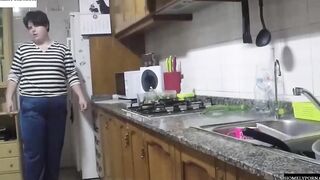 She has arrived from shopping and they nailed inside the kitchen