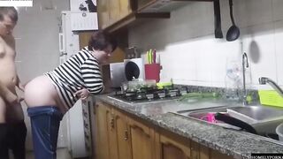 She has arrived from shopping and they nailed inside the kitchen