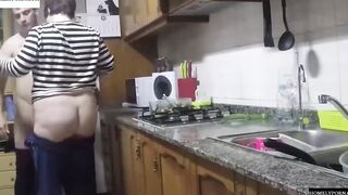 She has arrived from shopping and they nailed inside the kitchen
