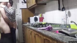 She has arrived from shopping and they nailed inside the kitchen