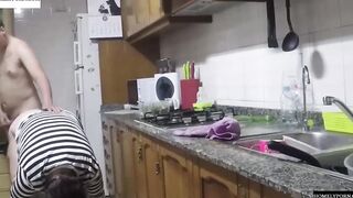 She has arrived from shopping and they nailed inside the kitchen