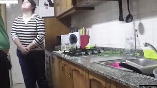 She has arrived from shopping and they nailed inside the kitchen