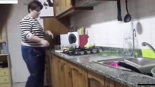 She has arrived from shopping and they nailed inside the kitchen