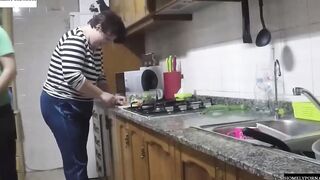 She has arrived from shopping and they nailed inside the kitchen