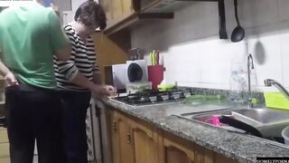 She has arrived from shopping and they nailed inside the kitchen