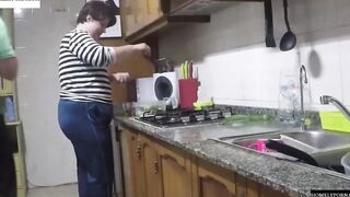 She has arrived from shopping and they nailed inside the kitchen