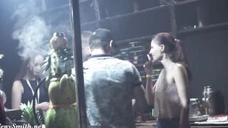 Nude woman inside the club with bodyart. Prank