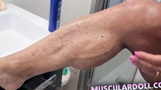 Pro Female Bodybuilder put cream on her naked Muscle Body