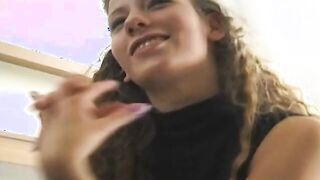 adorable chick lolls on the bed and shows her willing snatch