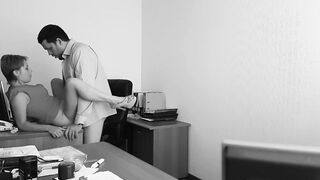 The boss fucks his employer at the office table and films it on concealed webcam