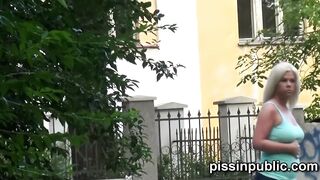 Desperate girls find a hideaway inside a busy city to squat down and peeing