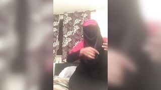 Lonely Niqabi Hijabi woman sucking off vibrator & shaking butt