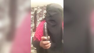Lonely Niqabi Hijabi woman sucking off vibrator & shaking butt