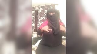 Lonely Niqabi Hijabi woman sucking off vibrator & shaking butt