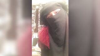 Lonely Niqabi Hijabi woman sucking off vibrator & shaking butt