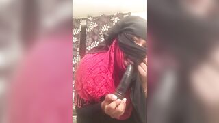 Lonely Niqabi Hijabi woman sucking off vibrator & shaking butt