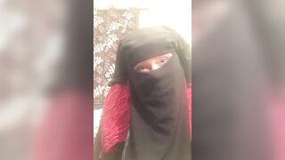 Lonely Niqabi Hijabi woman sucking off vibrator & shaking butt