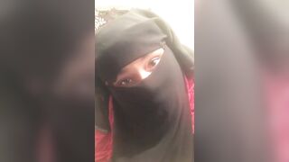 Lonely Niqabi Hijabi woman sucking off vibrator & shaking butt