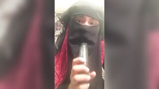 Lonely Niqabi Hijabi woman sucking off vibrator & shaking butt